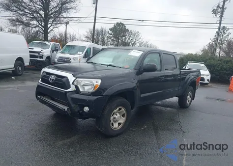 2015 Toyota Tacoma Base V6 z USA, uszkodzony, nr VIN 5TFMU4FN1FX031919